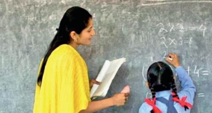Teachers Recruitment In UP Teacher teaching in a class